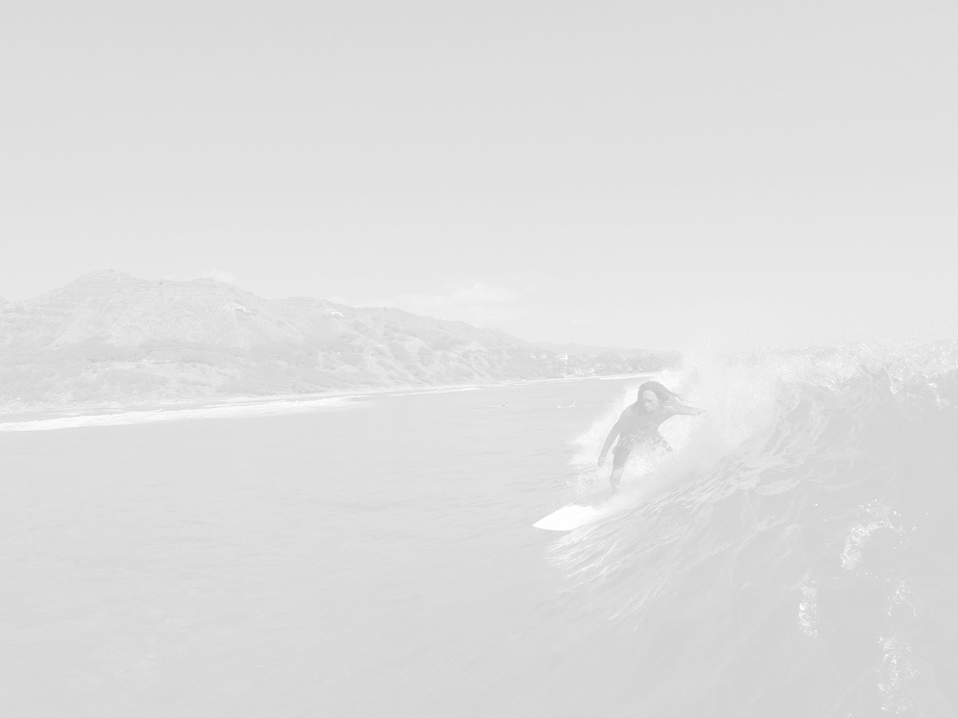 Surfer Riding A Wave In Wetsuit Img