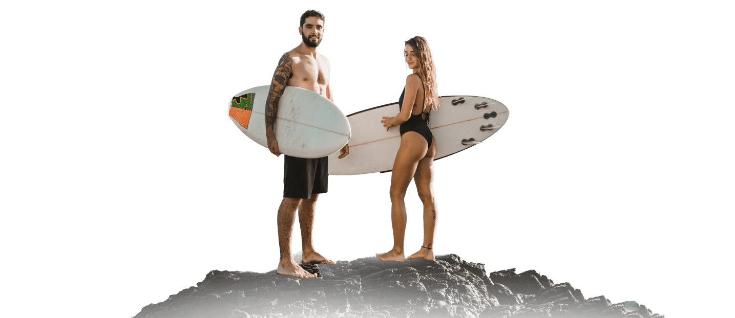 Couples In Swimsuit Holding Surfboard Img